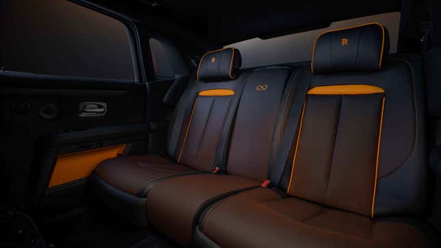 Black and orange rear seat of a Rolls-Royce Ghost