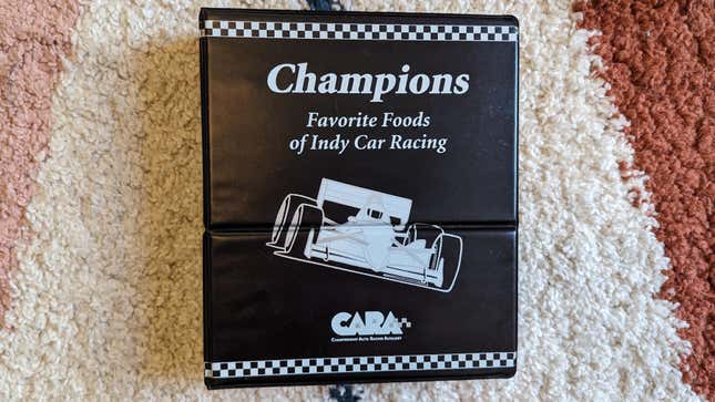 A photo of the "Champions: Favorite Foods of Indy Car Racing" cookbook
