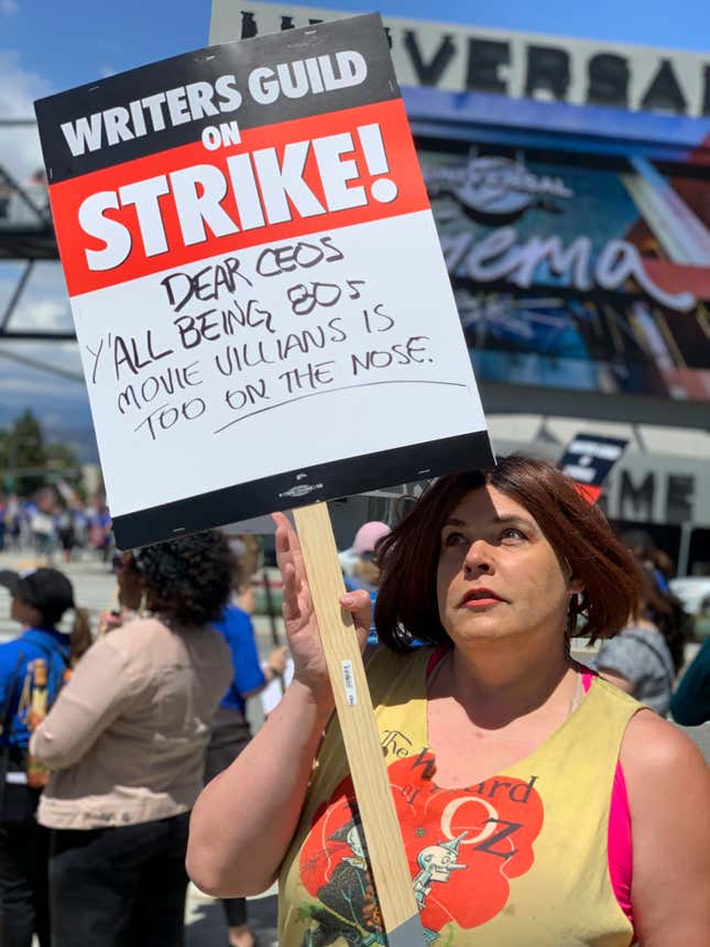 Shadi Petosky appears on a picket line Los Angeles on Aug. 31, 2023. Petosky is among entertainment industry workers forced to take most any work they can get to stay afloat during the prolonged Hollywood strikes. (Jen Richards via AP)