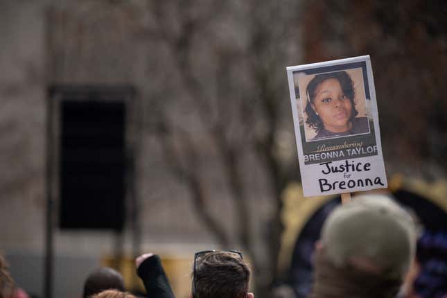  A sign demanding justice for Breonna Taylor is held up during a memorial protest in honor of her at Jefferson Square Park on March 13, 2021, in Louisville, Kentucky. Today marks the one-year anniversary since Taylor was killed in her apartment during a botched no-knock raid executed by LMPD. 