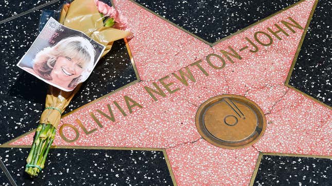 Flowers are placed on Olivia Newton-John’s Hollywood Walk of Fame star on August 08, 2022 in Hollywood, California