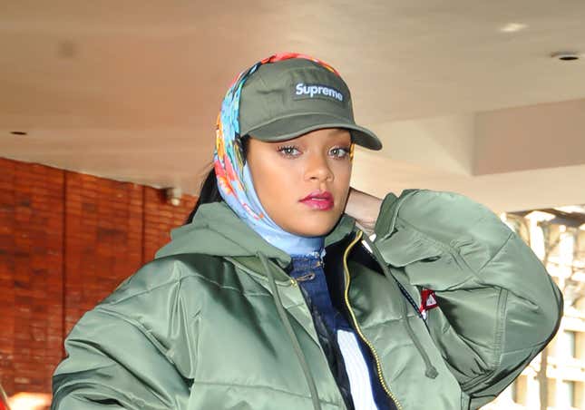 Rihanna is seen walking in a Supreme hat and bomber jacket in Soho on March 23, 2017 in New York City. 