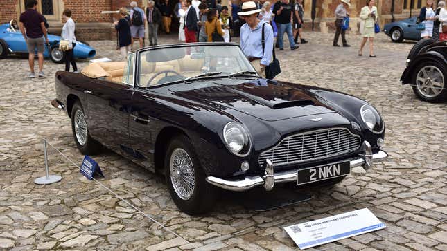 A photo of a convertible Aston Martin at an auction. 