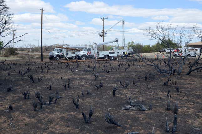 Xcel Energy crews begin replacing hundreds of power poles in Fritch, Texas, May, 13, 2014 after a devastating wildfire tore through the small community Sunday evening. The utility provider Xcel Energy says its facilities appeared have played a role in igniting a massive wildfire in the Texas Panhandle that grew to the largest blaze in state history. The provider made the statement in a news release Thursday, March 7, 2024. (Michael Schumacher/Amarillo Globe-News via AP, file)