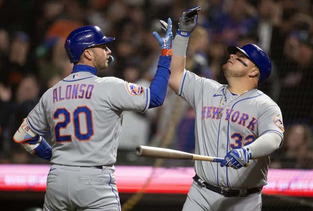 From left, New York Mets first baseman Pete Alonso, center fielder