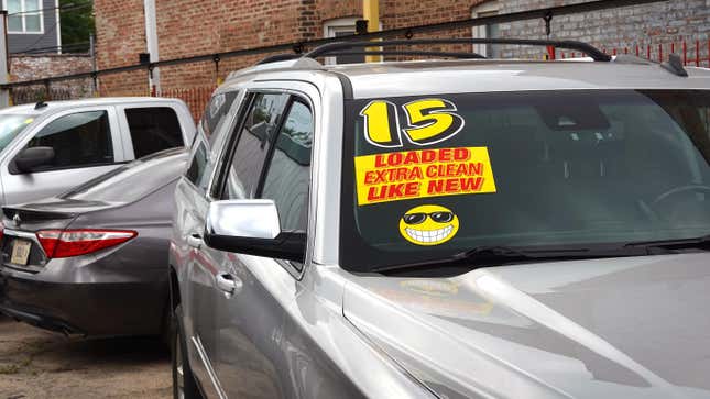 Used cars are offered for sale at a dealership on July 11, 2023 in Chicago, Illinois