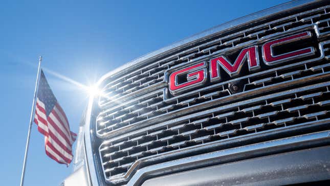 A GMC pickup truck is displayed for sale on a lot at a General Motors dealership in Austin, Texas