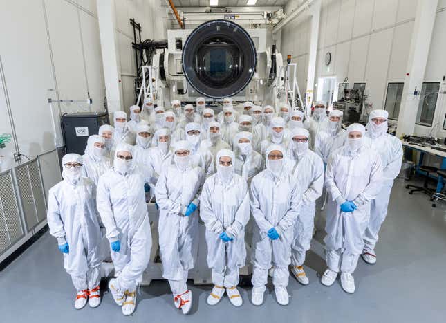 Most of the LSST Camera crew in the clean room with the instrument.