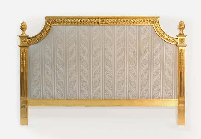 A Louis XVI style headboard, expected to go for €200-€300.