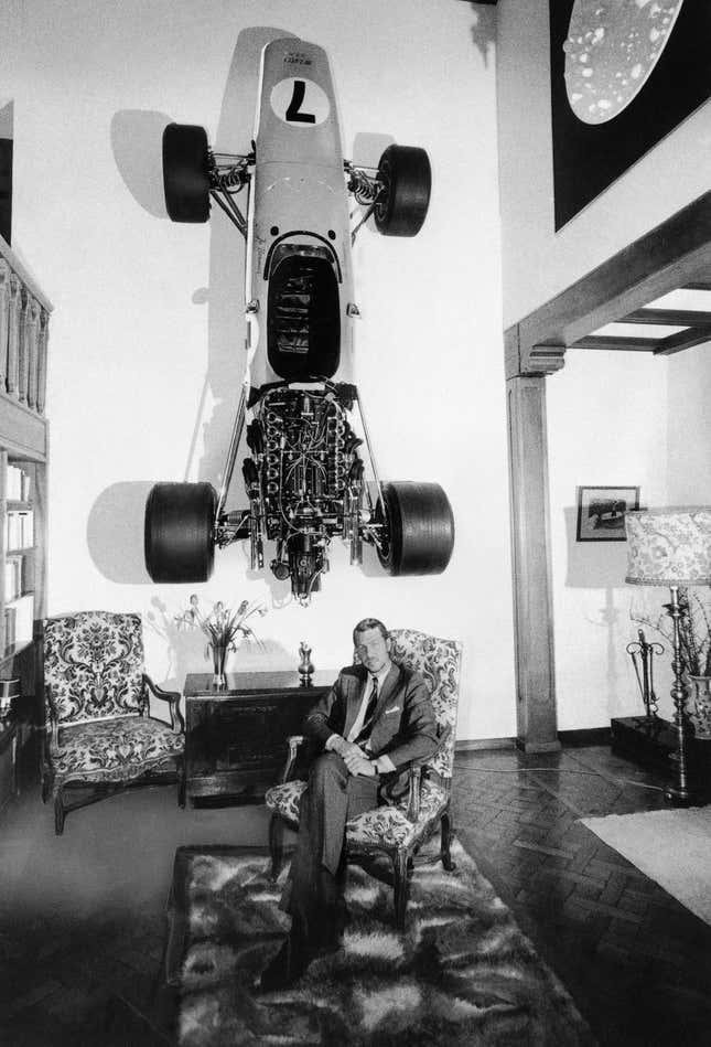 Swedish race driver Joakim Bonnier poses at his Swiss villa with a McLaren BRM formula race car hanging on the wall in Le Muids, Switzerland, Jan. 29, 1972. Bonnier was killed racing at Le Mans in June 1972