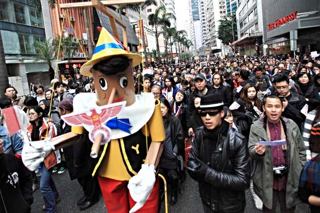 Artist Kacey Wong brought “the Pinocchio” to the January 1 Hong Kong protest.