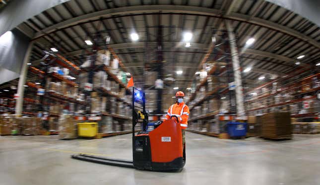 An employee works at the Amazon logistics centre in Suelzetal near Magdeburg, eastern Germany.