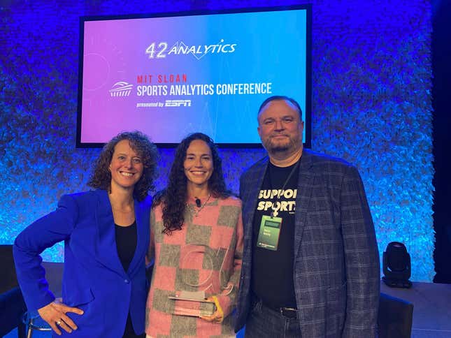 This March 2023 photo provided by the Sloan Sports Analytics Conference shows Sue Bird, center, posed with Jessica Gelman, left and Daryl Morley, right, after presenting Bird with the Lifetime Achievement Alpha Award at the 2023 Sloan Sports Analytics Conference in Boston. Jessica Gelman has become an influential leader and innovator in the sports industry. She co-founded the MIT Sloan Sports Analytics Conference. She teamed with Philadelphia 76ers President Daryl Morey to not only found Sloan, but guide it into the preeminent forum for number-crunchers. (Jeff Pinette/Sloan Sports Analytics Conference via AP)