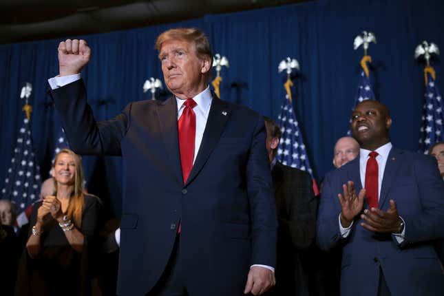 Senator Tim Scott (far right) and others applaud as President Trump wins the February 2024 Republican primary in South Carolina