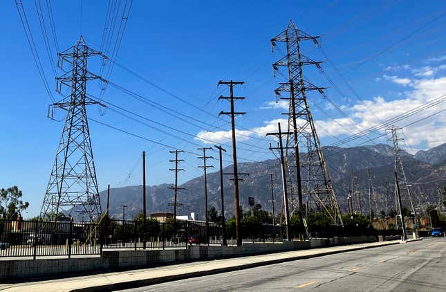 FILE - Electrical grid towers are seen during a heat wave where temperature reached 105 degrees Fahrenheit, in Pasadena, Calif., on Aug. 31, 2022. On Wednesday, March 27, 2024, California regulators released a proposal that would change how utility bills are calculated. Regulators say this could help control price spikes during the hot summer months. (AP Photo/John Antczak, File)