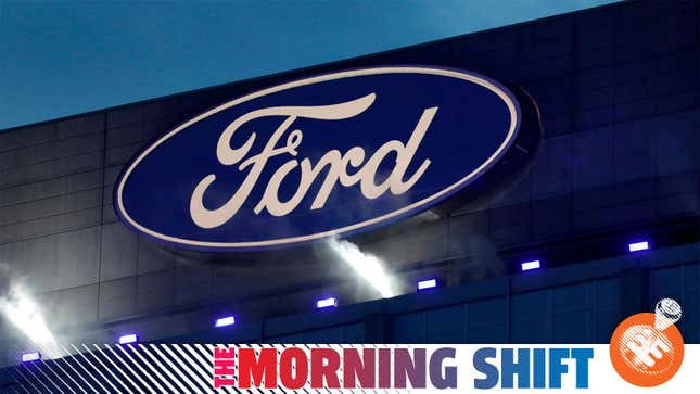 A photo of the Ford blue oval logo on the side of a building. 