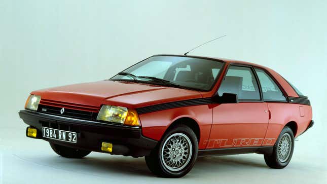 A photo of a red Renault Fuego coupe. 