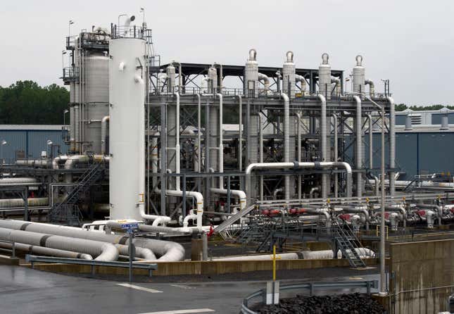 FILE - A heat exchanger and transfer pipes at Dominion Energy&#39;s Cove Point LNG Terminal in Lusby, Md., June 12, 2014. The Biden administration is delaying consideration of new natural gas export terminals in the United States, even as gas shipments to Europe and Asia have soared since Russia’s invasion of Ukraine. (AP Photo/Cliff Owen, File)