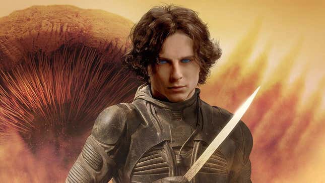 Paul Atreides stands with a sandworm behind him