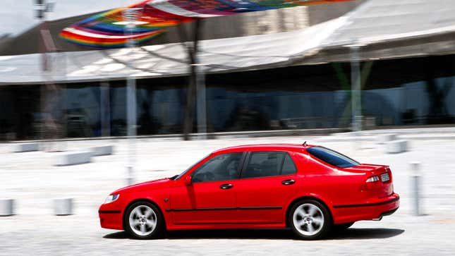 A red Saab 9-5 sedan.