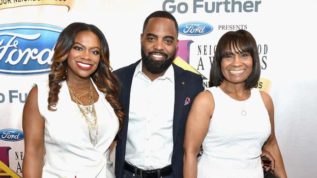 ATLANTA, GA - AUGUST 08: (L-R) Kandi Burruss, Todd Tucker and Joyce Burruss attend the 2015 Ford Neighborhood Awards Hosted By Steve Harvey at Phillips Arena on August 8, 2015 in Atlanta, Georgia.
