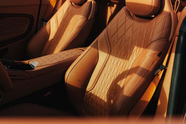 Front seats of a brown Aston Martin DB12 Volante
