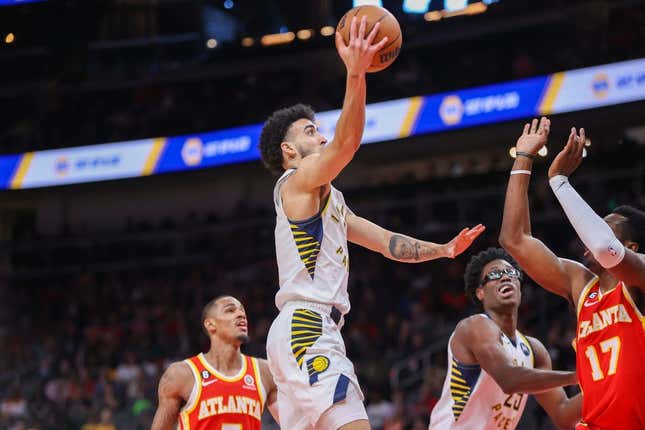 Mar 25, 2023; Atlanta, Georgia, USA; Indiana Pacers guard Chris Duarte (3) shoots against the Atlanta Hawks in the second quarter at State Farm Arena.