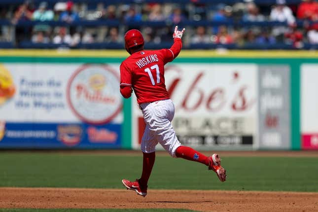 Mar 20, 2023; Clearwater, Florida, USA; Philadelphia Phillies first baseman Rhys Hoskins (17) rounds the bases after hitting a two-run home run against the Baltimore Orioles in the second inning during spring training at BayCare Ballpark.