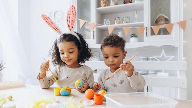 Children decorating eggs for easter