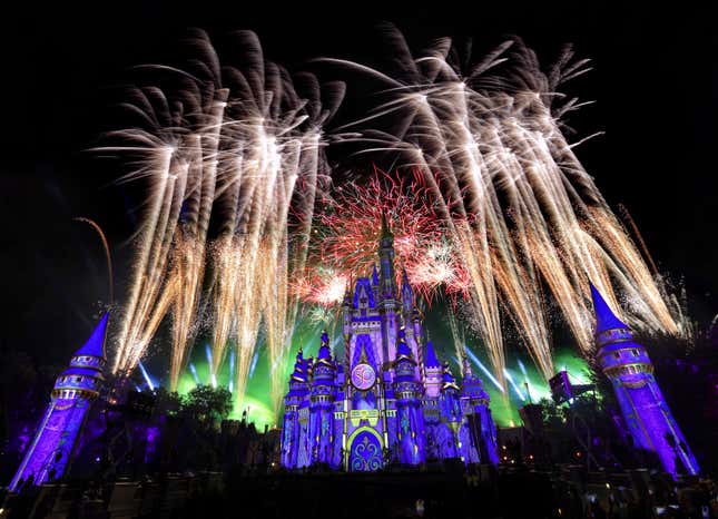 Fireworks launch over Cinderella Castle at the Magic Kingdom at Walt Disney World, in Lake Buena Vista, Fla., Sept. 30, 2021. For Disney fans, Halloween is among the most desirable (and expensive) times to visit its theme parks. That’s largely due to the after-hours parties: the Oogie Boogie Bash in California and Mickey’s Not-So-Scary Halloween Party in Florida. Disney Halloween parties are held on select nights starting as early as August and can cost up to about $210 per person. (Joe Burbank/Orlando Sentinel via AP, file)