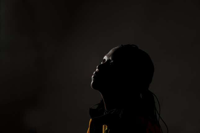 Black woman in shadow