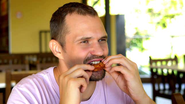 Image for article titled Study Finds 80% Of Food Waste Result Of Half-Assed Chicken Wing Eating Technique