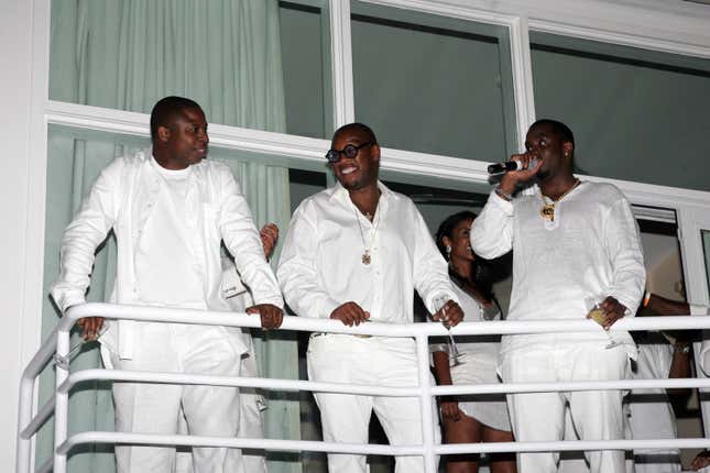 Doug E Fresh, left; Andre Harrell, and Sean “Diddy” Combs at “The Real White Party” presented by Sean “Diddy” Combs at the Combs’ East Hampton estate on September 2, 2007 in East Hampton, New York.