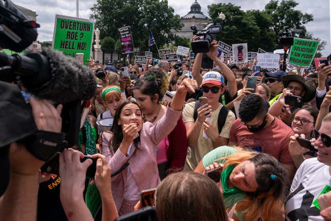 Rep. Alexandria Ocasio-Cortez (D-NY) speaks to abortion-rights activists  in front of the U.S. Supreme Court after the Court announced a ruling  in the Dobbs v Jackson Women’s Health Organization case on June 24, 2022  in Washington, DC.