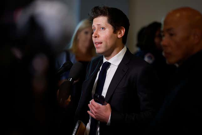 Sam Altman wearing a suit and speaking