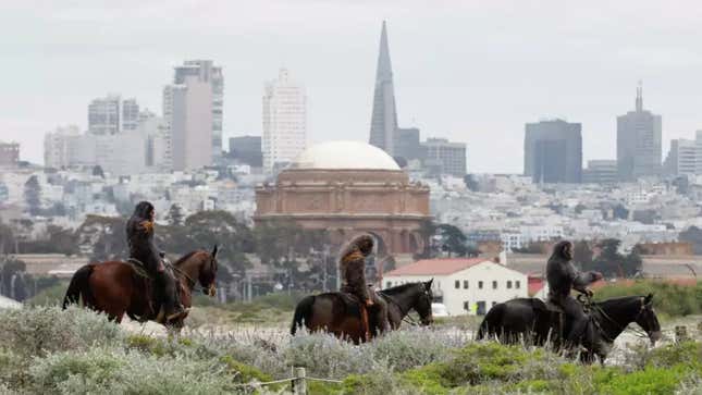 Costumed apes on horseback overlooking San Fransico in promo for Kingdom of the Planet of the Apes.