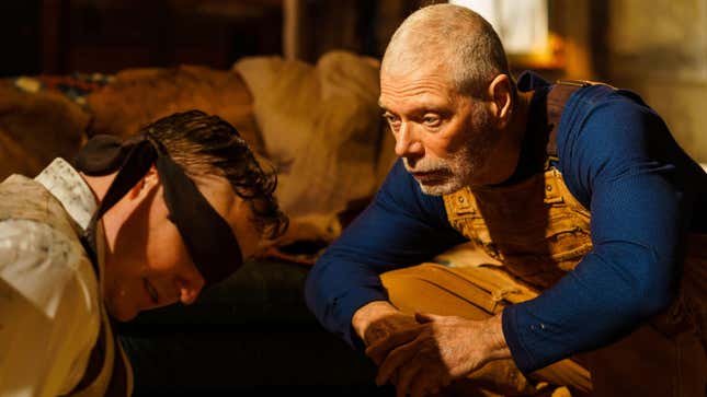 [L-R] Patch Darragh as “Bible Salesman” and Stephen Lang as “Old Man” in the thriller, OLD MAN, an RLJE Films release