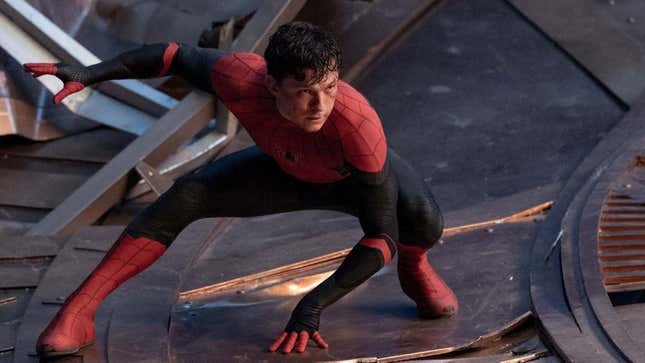 Tom Holland poses in his Spider-Man costume (no mask though) in a scene from No Way Home.