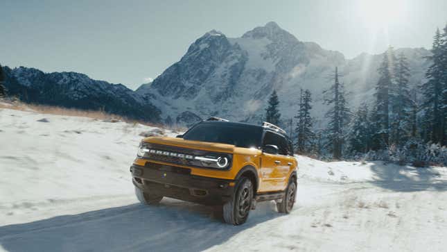 A photo of a yellow Ford Bronco Sport SUV. 