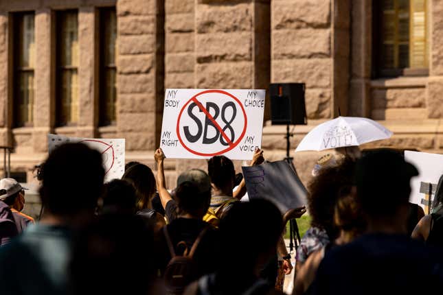AUSTIN, TX - SEPTEMBER 11: Abortion rights activists rally at the Texas State Capitol on September 11, 2021 in Austin, Texas. Texas Lawmakers recently passed several pieces of conservative legislation, including SB8, which prohibits abortions in Texas after a fetal heartbeat is detected on an ultrasound, usually between the fifth and sixth weeks of pregnancy. (Photo by Jordan Vonderhaar/Getty Images)