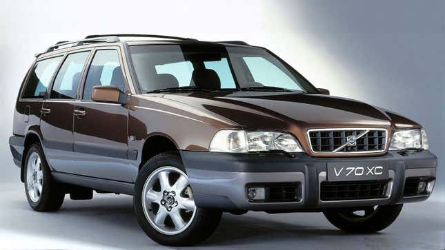 A photo of a brown Volvo V70 XC station wagon. 