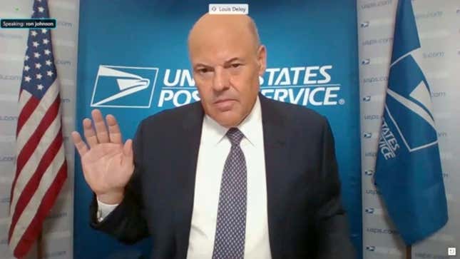  In this screenshot from U.S. Senate’s livestream, U.S. Postal Service Postmaster General Louis DeJoy is sworn in for a virtual Senate Homeland Security and Governmental Affairs Committee hearing on U.S. Postal Service operations during Covid-19 pandemic August 21, 2020 in Washington, DC.