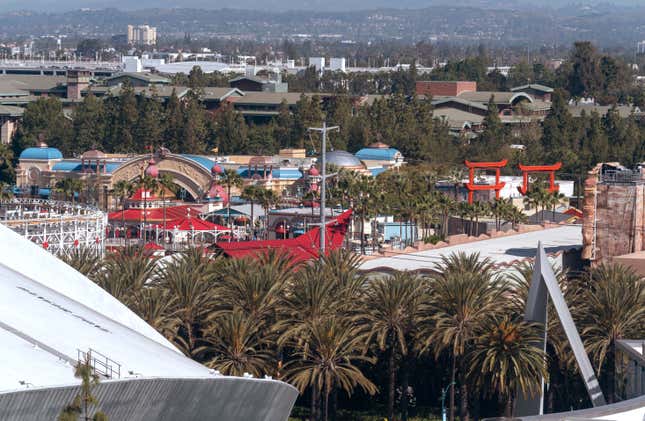 A view of Disneyland&#39;s amusement park lot is seen through a window in Anaheim, Wednesday, April 17, 2024. Workers who help bring Disneyland&#39;s beloved characters to life said Wednesday they collected enough signatures to support their push for a union. (AP Photo/Damian Dovarganes)