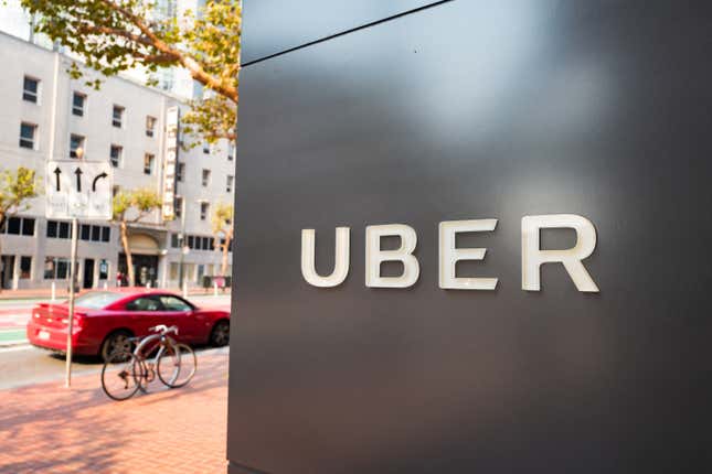 Sign with logo at the headquarters of car-sharing technology company Uber in the South of Market (SoMa) neighborhood of San Francisco, California. 