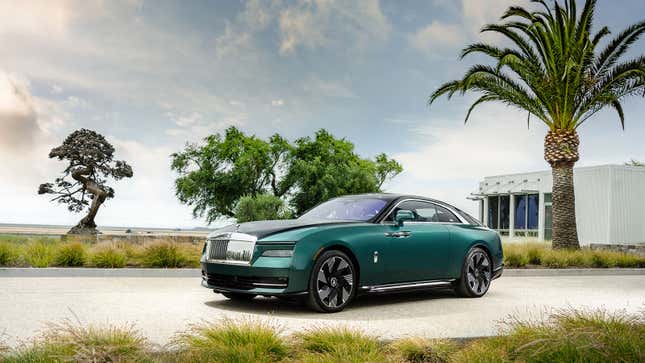 A photo of the front quarter of an electric Rolls Royce Spectre. 