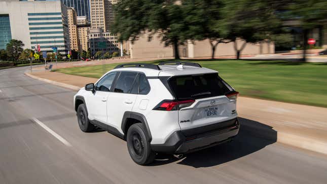 A photo of a white Toyota Rav 4 SUV. 