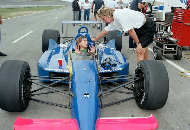 Lyn St. James talks to LPGA Hall of Fame golfer Carol Mann at Texas World Speedway, 1992