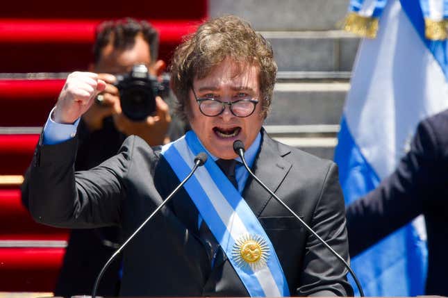 Argentina&#39;s newly sworn-in President Javier Milei speaks outside the Congress in Buenos Aires, Argentina, Sunday, Dec. 10, 2023. (AP Photo/Gustavo Garello)