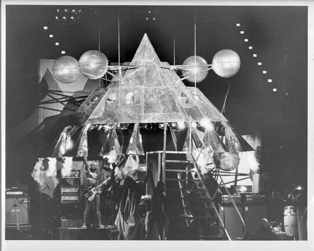 LOS ANGELES - JUNE 4: Band leader George Clinton emerges from The Mothership of the funk band Parliament-Funkadelic onstage on June 4, 1977 at the Coliseum in Los Angeles, California. 