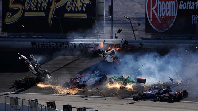 Image 22 in a sequence of 47 images of the crash in which Dan Wheldon of England driver of the #77 Bowers & Wilkins Sam Schmidt Motorsports Dallara Honda was involved during the Las Vegas Indy 300, part of the IZOD IndyCar World Championships presented by Honda on October 16, 2011 at the Las Vegas Motor Speedway in Las Vegas, Nevada.